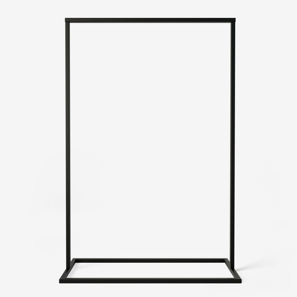 Free standing black clothing rack made from square metal pipes