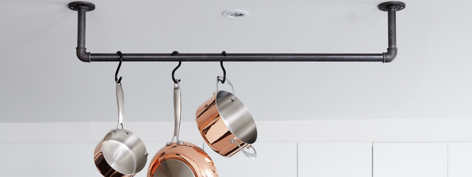 RackBuddy - Ceiling mounted clothing rails made of pipes