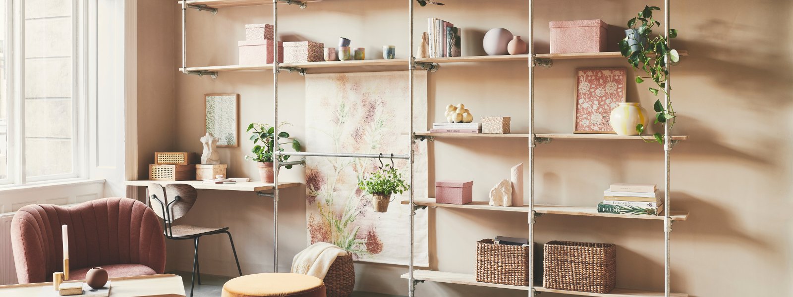 Industrial clothes racks made out of black iron waterpipes