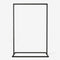 Free standing black clothing rack made from square metal pipes