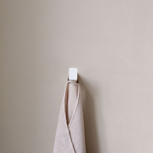 Wall mounted hook perfect for towels in bathroom or kitchen in matt white