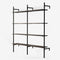Black powder-coated shelving system with 2 sections, each with four height-adjustable shelves in smoked oak veneer