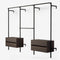 Walk in system with 2 smoked oak chests of drawers and 4 hanging rails to hang clothes on. For both short and long.