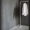 Simplistic clothing rack for entrance or open wardrobe system made from white iron pipes