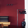 wall mounted industrial clothes rail dark iron pipes for sturdy rack in the entrance