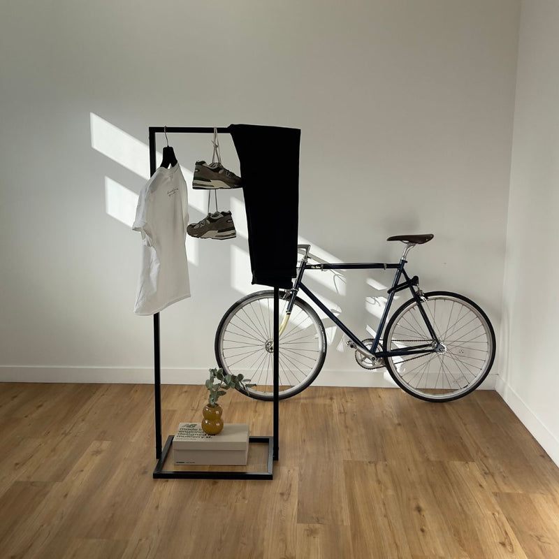 Free standing display rack for clothes and shoes modern simplistic design black iron pipes