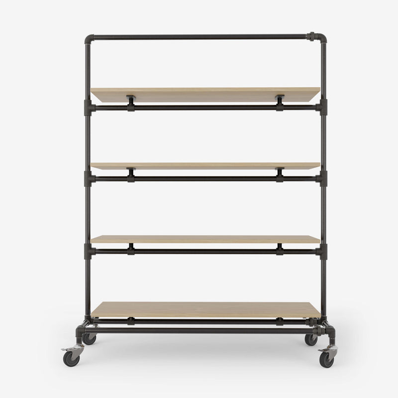 Clothes rack on wheels made with dark pipes and with shelves in classic oak