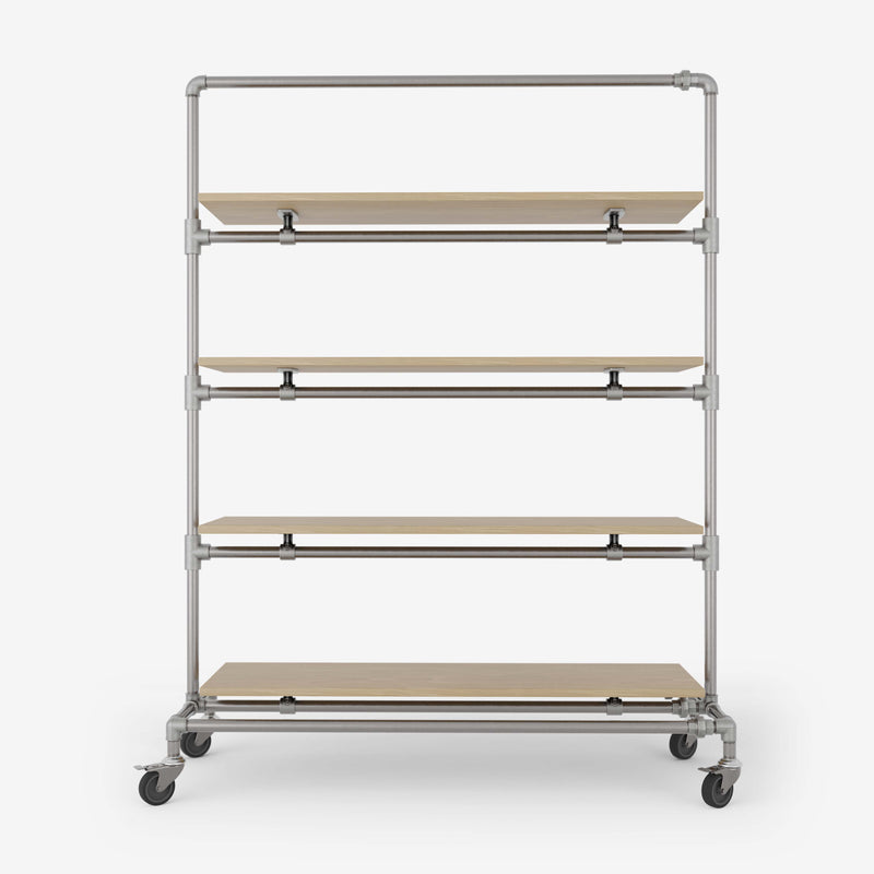 Clothes rack on wheels made with silver pipes and with shelves in classic oak