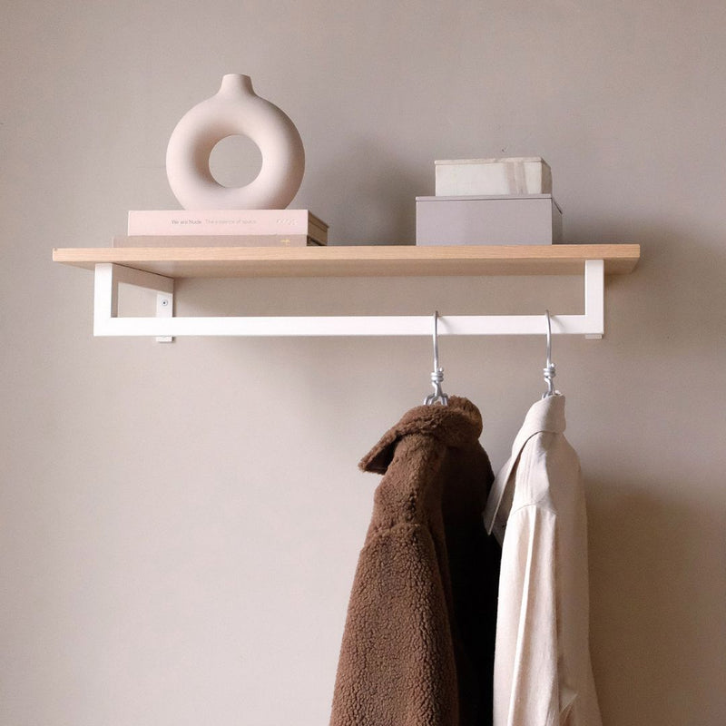 wall mounted shelf in oak with modern rail in white square iron pipes for jackets