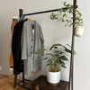 Modern display rack with strong iron rail to hang clothes and two rails to place shoes and boxes underneath
