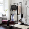 Free standing practical clothes rack made from water pipes with space for long and short clothes