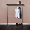 Free standing clothing rack made from industrial iron pipes dark with dark pine shelf on top and shoe rack at bottom