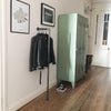 retro design for entrance with modern water pipe clothing rail for leather jackets