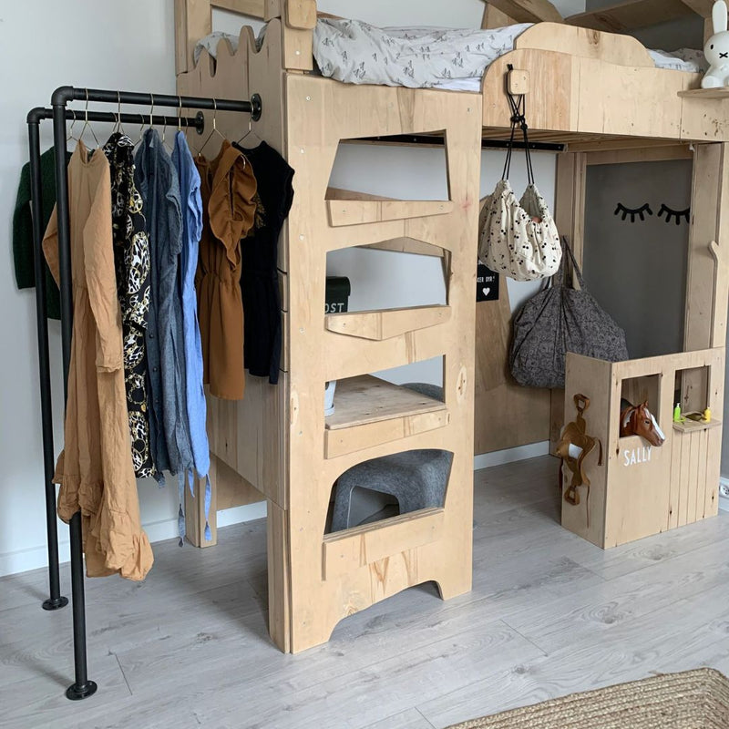 simple open wardrobe for children made from dark water pipes attached to bunk bed