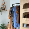 wall mounted clothes rail with support to floor made dark water pipes for industrial design