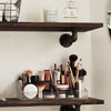 Open shelves in bathroom made from wood and cool supports in industrial design