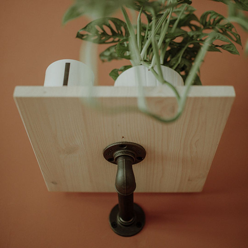 small wall mounted shelves square made from pine shelf with dark waterpipe support for plant