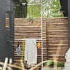 Free standing clothes rack from rust free iron pipes for the outdoor shower and terrace