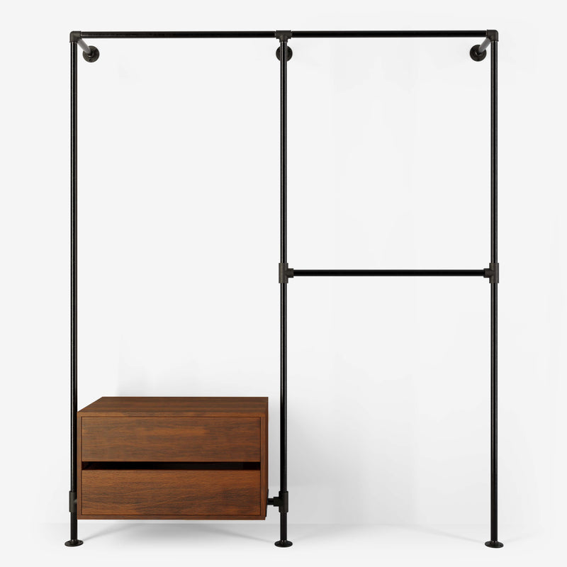 Walk-in wardrobe with tree rails and one dresser made with dark pipes and smoked oak